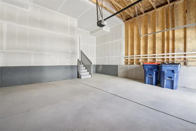 a view of an empty room and a window