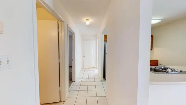 a view of bathroom with a tub shower and a sink