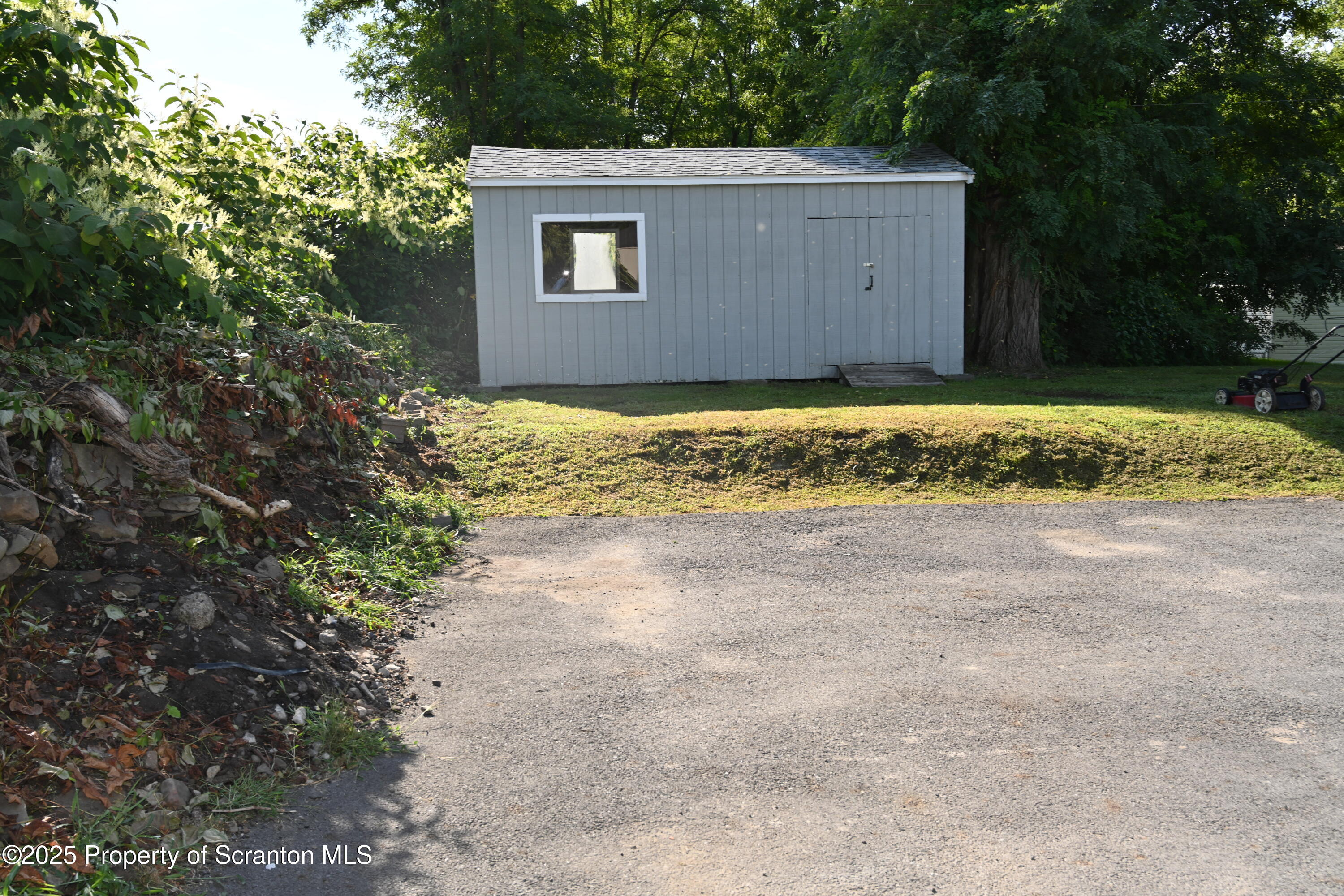 84 Spring Street Great Bend, PA 18821 - Photo 17 of 20 a view of house with a yard