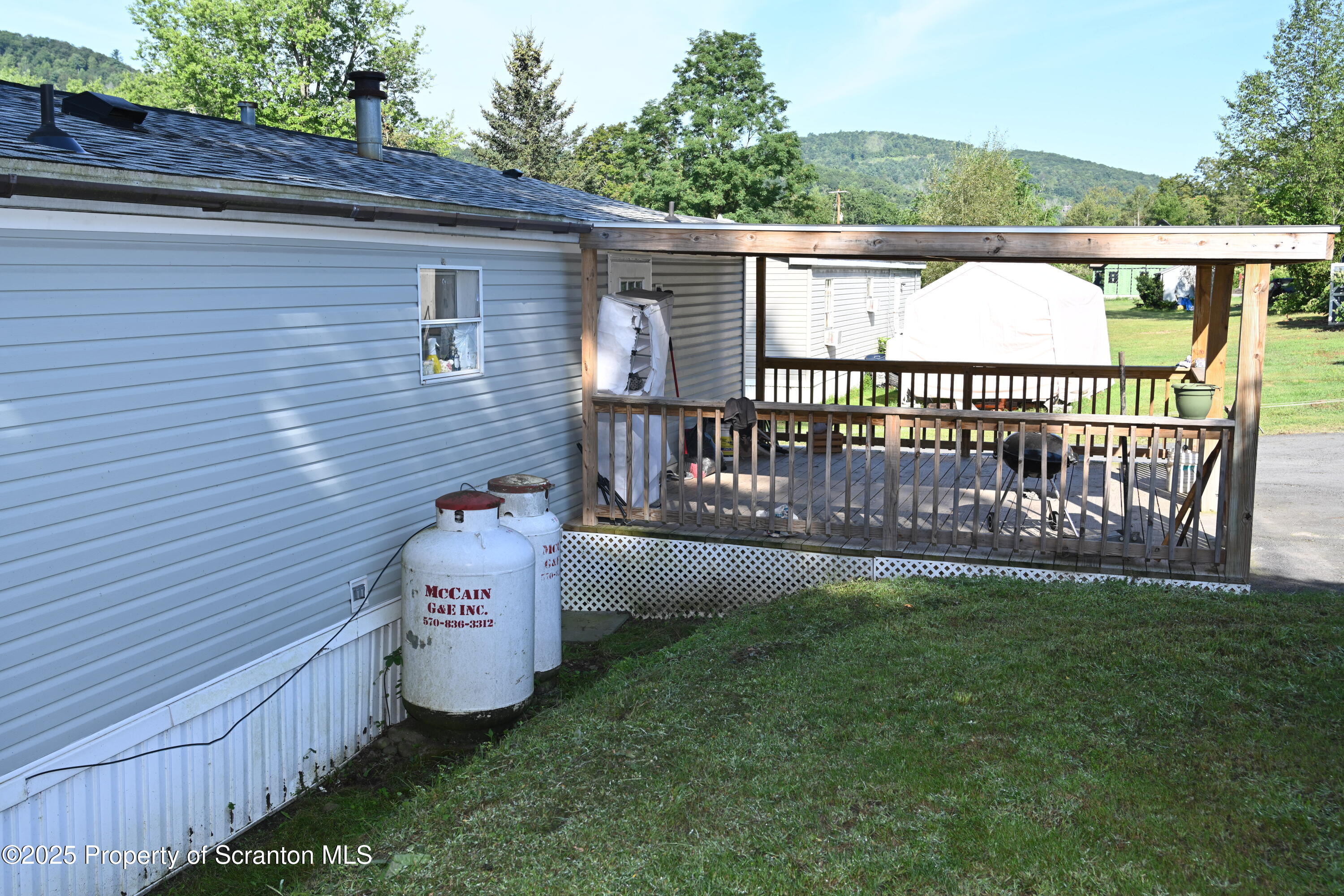 84 Spring Street Great Bend, PA 18821 - Photo 20 of 20 a view of a deck with a fence