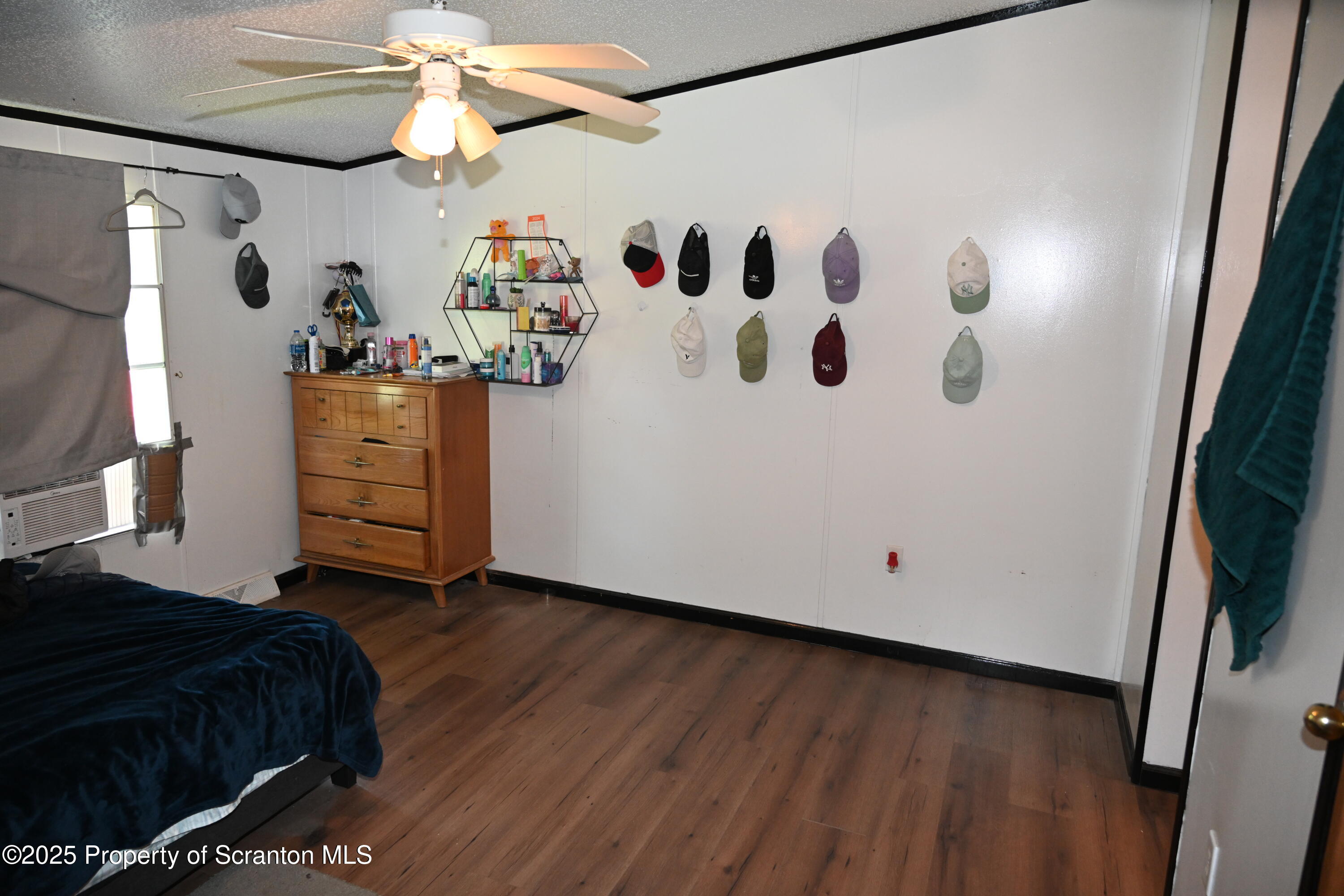 84 Spring Street Great Bend, PA 18821 - Photo 6 of 20 a bedroom with a bed and a dresser