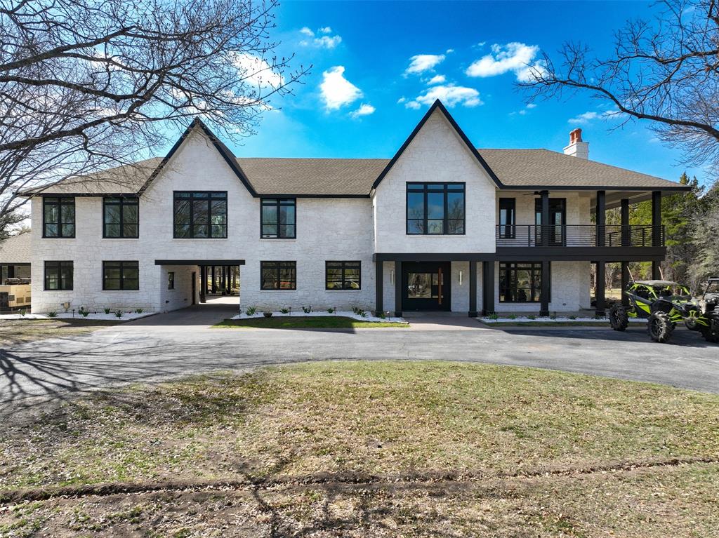 1000 West Wintergreen Road DeSoto, TX 75115 - Photo 11 of 40 a front view of a house with a yard