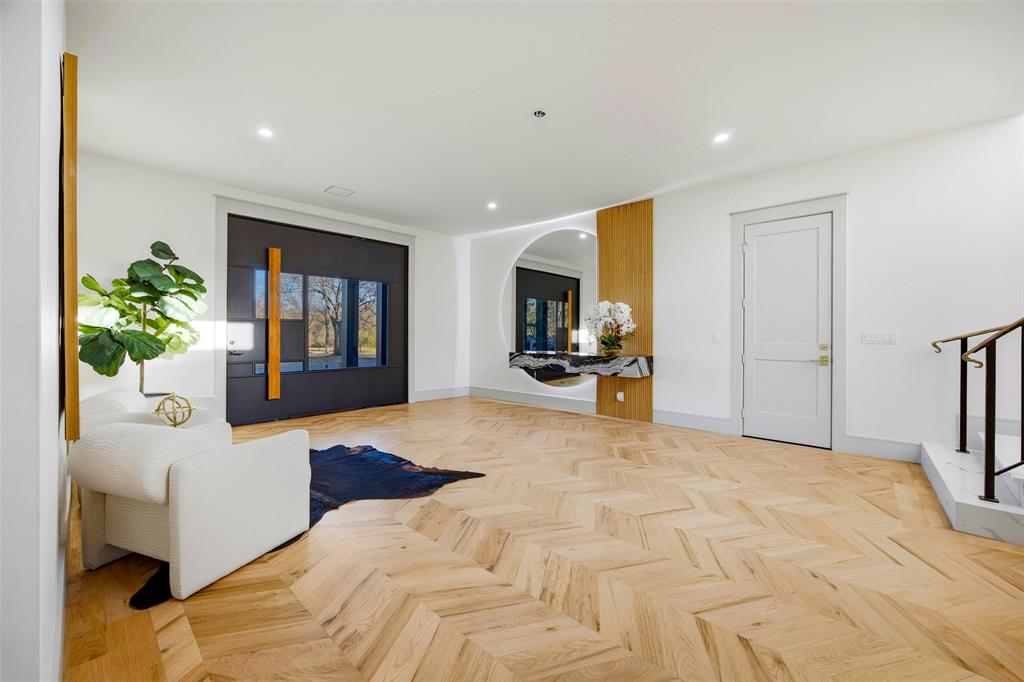 1000 West Wintergreen Road DeSoto, TX 75115 - Photo 14 of 40 a large bedroom with a bed and a table in it