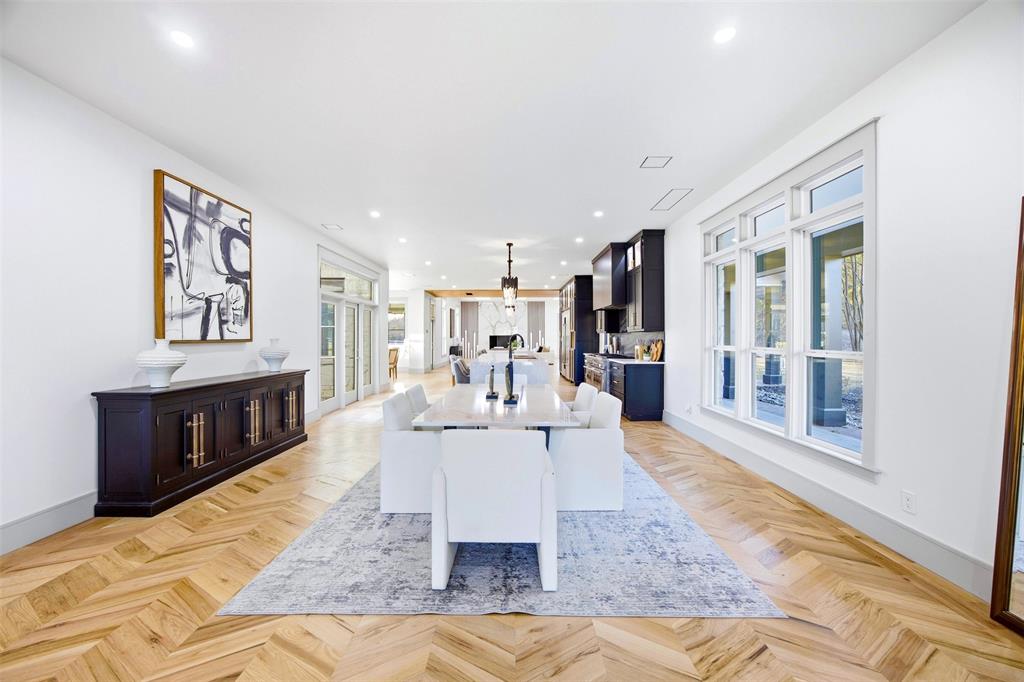 1000 West Wintergreen Road DeSoto, TX 75115 - Photo 16 of 40 a living room with furniture and a dining table with kitchen view