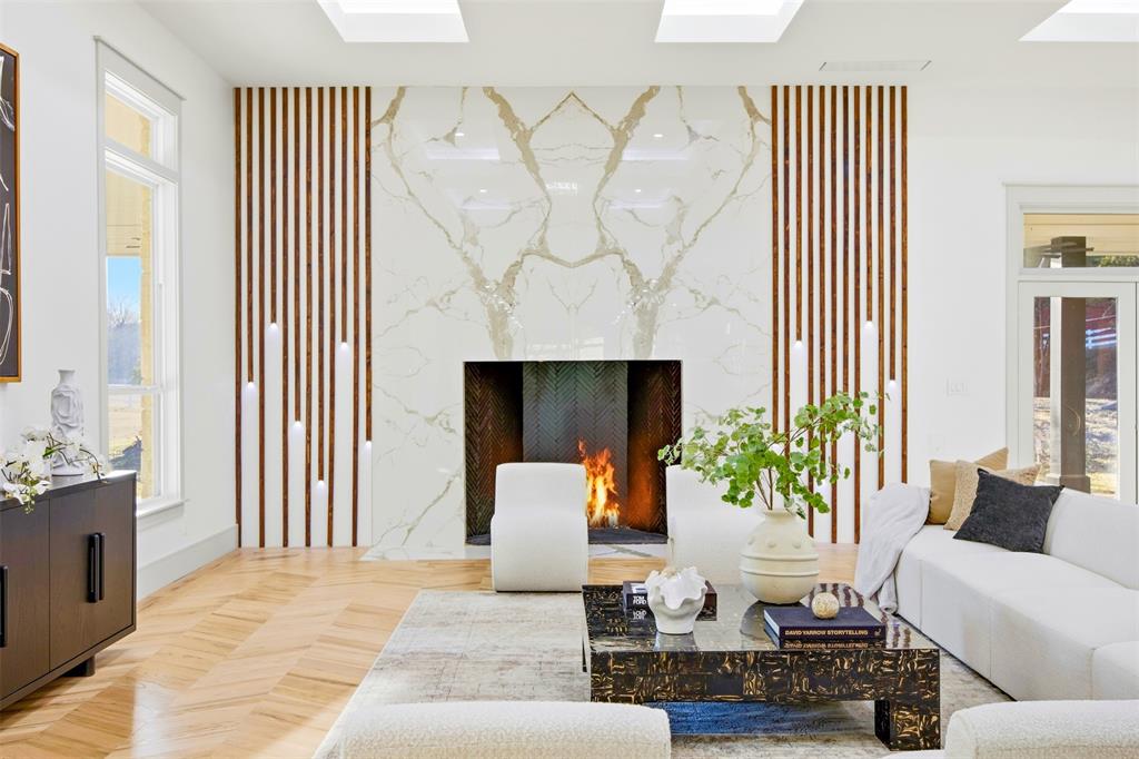 1000 West Wintergreen Road DeSoto, TX 75115 - Photo 18 of 40 a living room with furniture and a fireplace