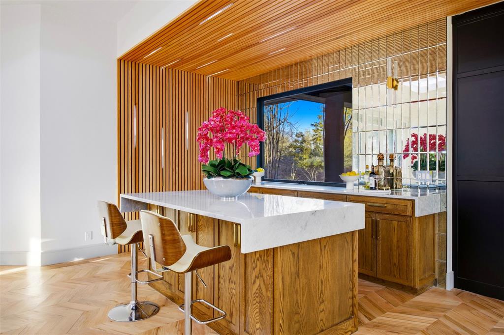 1000 West Wintergreen Road DeSoto, TX 75115 - Photo 20 of 40 a kitchen with a table and chairs in it