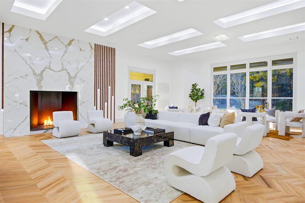 1000 West Wintergreen Road DeSoto, TX 75115 - Photo 2 of 40 a living room with furniture large window and a fireplace