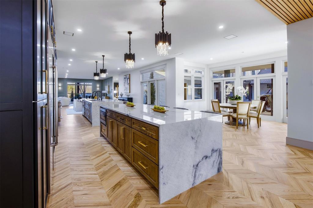 1000 West Wintergreen Road DeSoto, TX 75115 - Photo 5 of 40 a large kitchen with stainless steel appliances lots of counter space