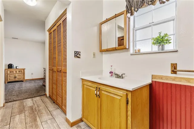 a utility room with sink dryer and washer