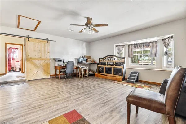 a utility room with sink dryer and washer