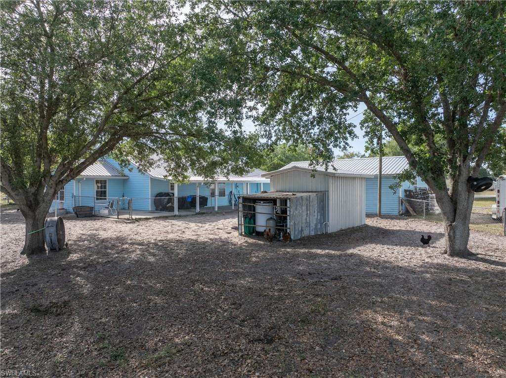 3666 Ft Simmons Avenue Fort Denaud, FL 33935 - Photo 37 of 41 Two storage sheds in backyard, NEW water softener system