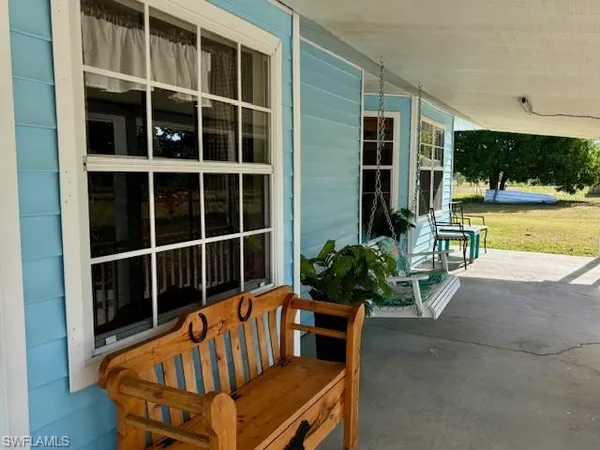 a view of a house with a porch