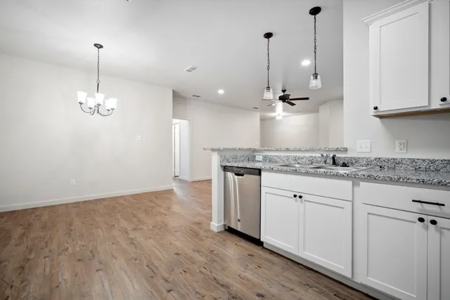 a view of a kitchen with marble kitchen and kitchen counter top