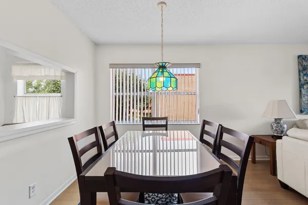 a view of a bedroom with furniture