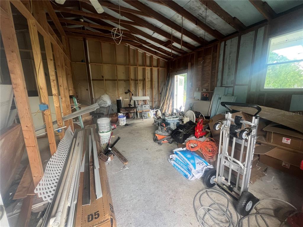 5855 Jack Brack Road St. Cloud, FL 34771 - Photo 44 of 86 a view of a room with gym equipment