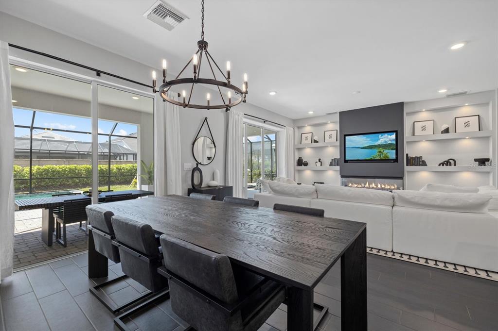 3508 Anchor Bay Trail Lakewood Ranch, FL 34211 - Photo 18 of 74 a view of a dining room with furniture window and outside view