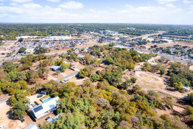 an aerial view of a city with lots of residential buildings
