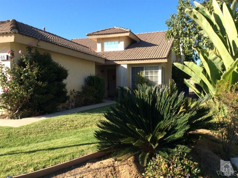 65 Valley Crest Road, Unit 74 Simi Valley, CA 93065 - Photo 2 of 25 a view of a house with a yard