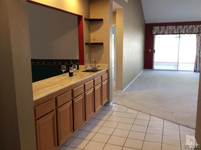 65 Valley Crest Road, Unit 74 Simi Valley, CA 93065 - Photo 11 of 25 a bathroom with a sink a mirror and a bathtub