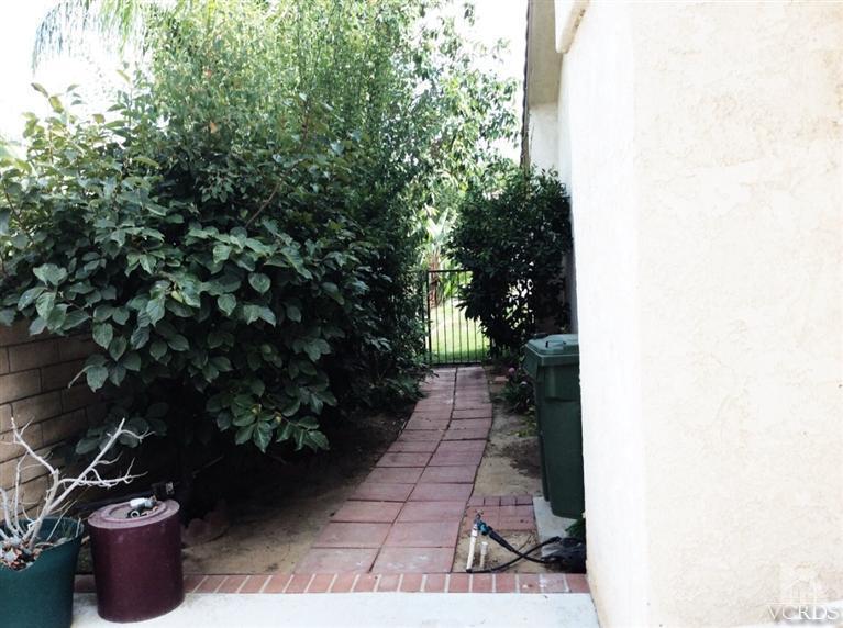 65 Valley Crest Road, Unit 74 Simi Valley, CA 93065 - Photo 20 of 25 a view of a backyard with plants