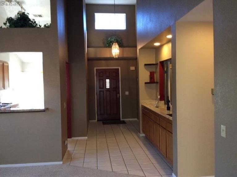 65 Valley Crest Road, Unit 74 Simi Valley, CA 93065 - Photo 3 of 25 a view of entryway and hall with wooden floor