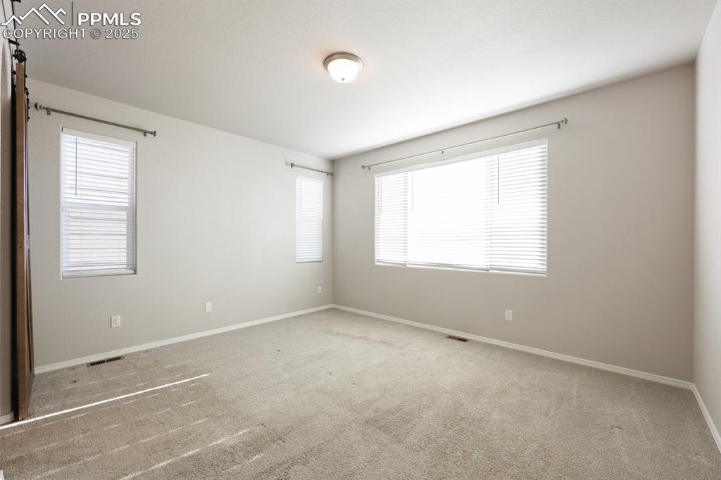 9962 Hidden Ranch Court Peyton, CO 80831 - Photo 14 of 48 a view of an empty room with a window