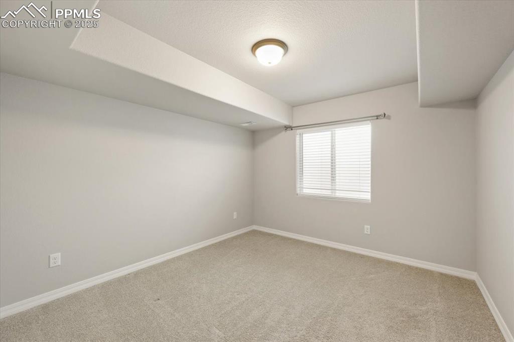 9962 Hidden Ranch Court Peyton, CO 80831 - Photo 22 of 48 an empty room with a window