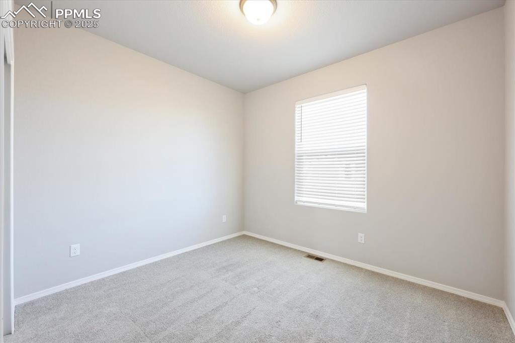 9962 Hidden Ranch Court Peyton, CO 80831 - Photo 29 of 48 an empty room with a window