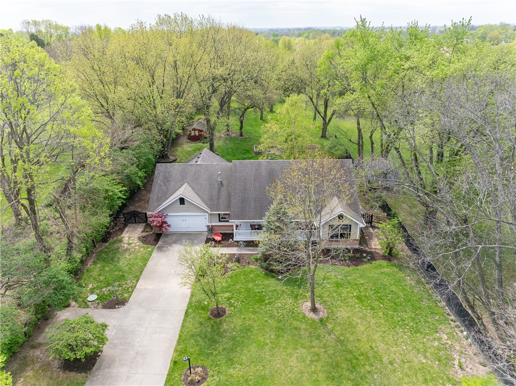 159 East Lytle 5 Points Road Springboro, OH 45066 - Photo 43 of 45 Perched among verdant trees, this home offers a private driveway and expansive lawn.