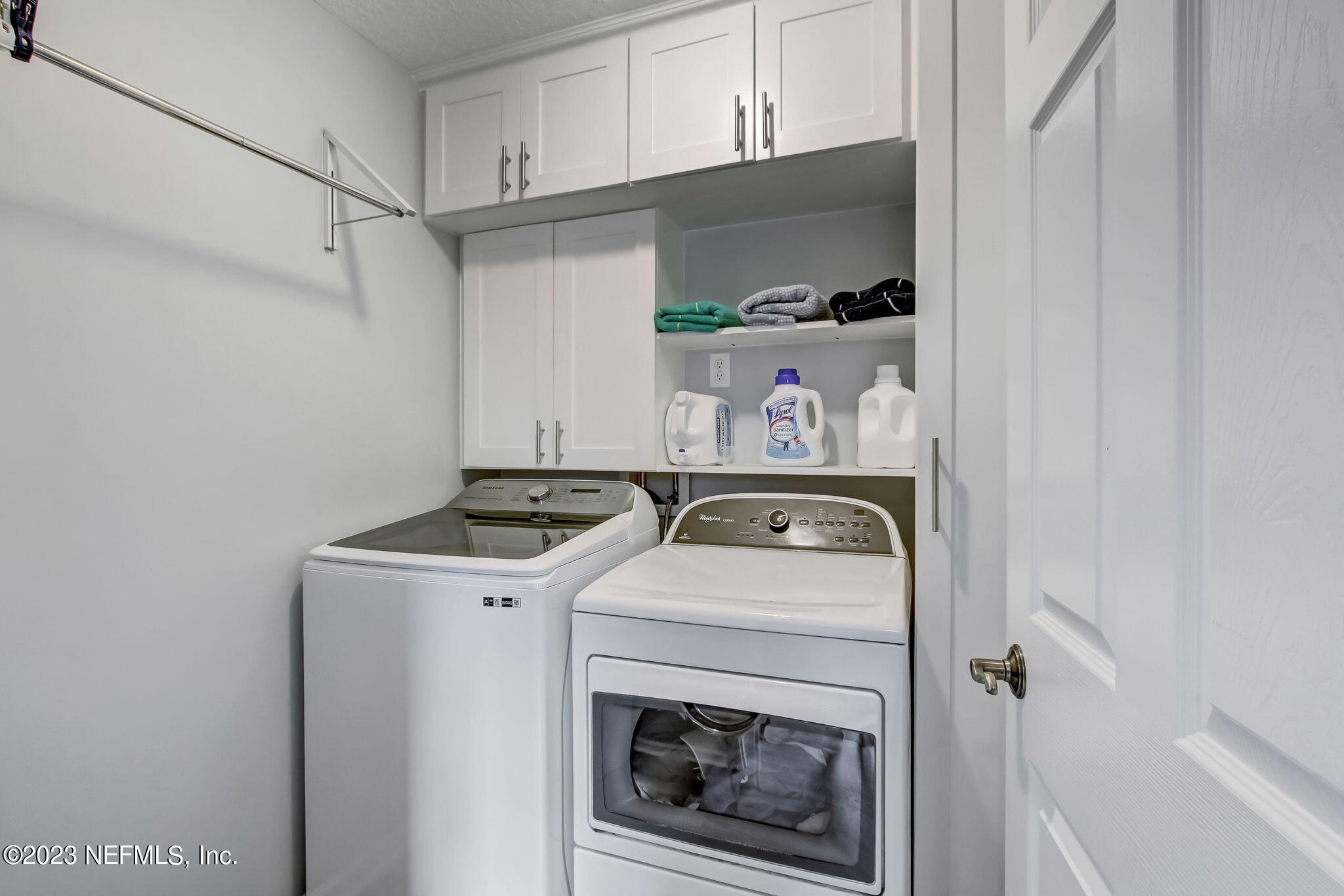 96054 Ridgewood Circle Fernandina Beach, FL 32034 - Photo 12 of 32 a utility room with dryer and washer