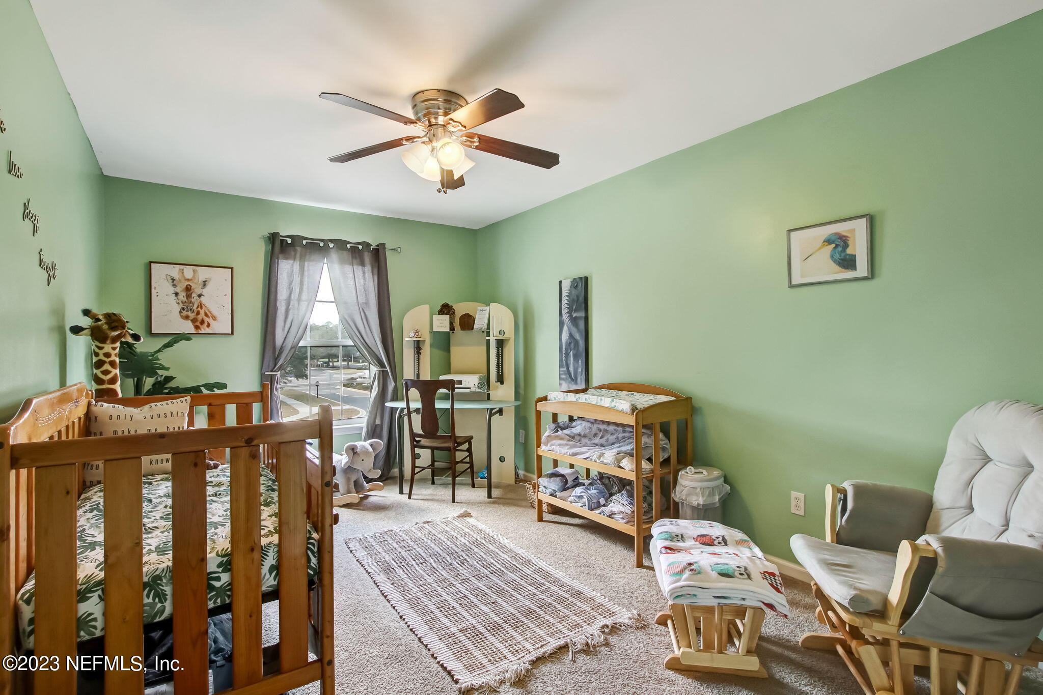 96054 Ridgewood Circle Fernandina Beach, FL 32034 - Photo 22 of 32 a living room with furniture and wooden floor