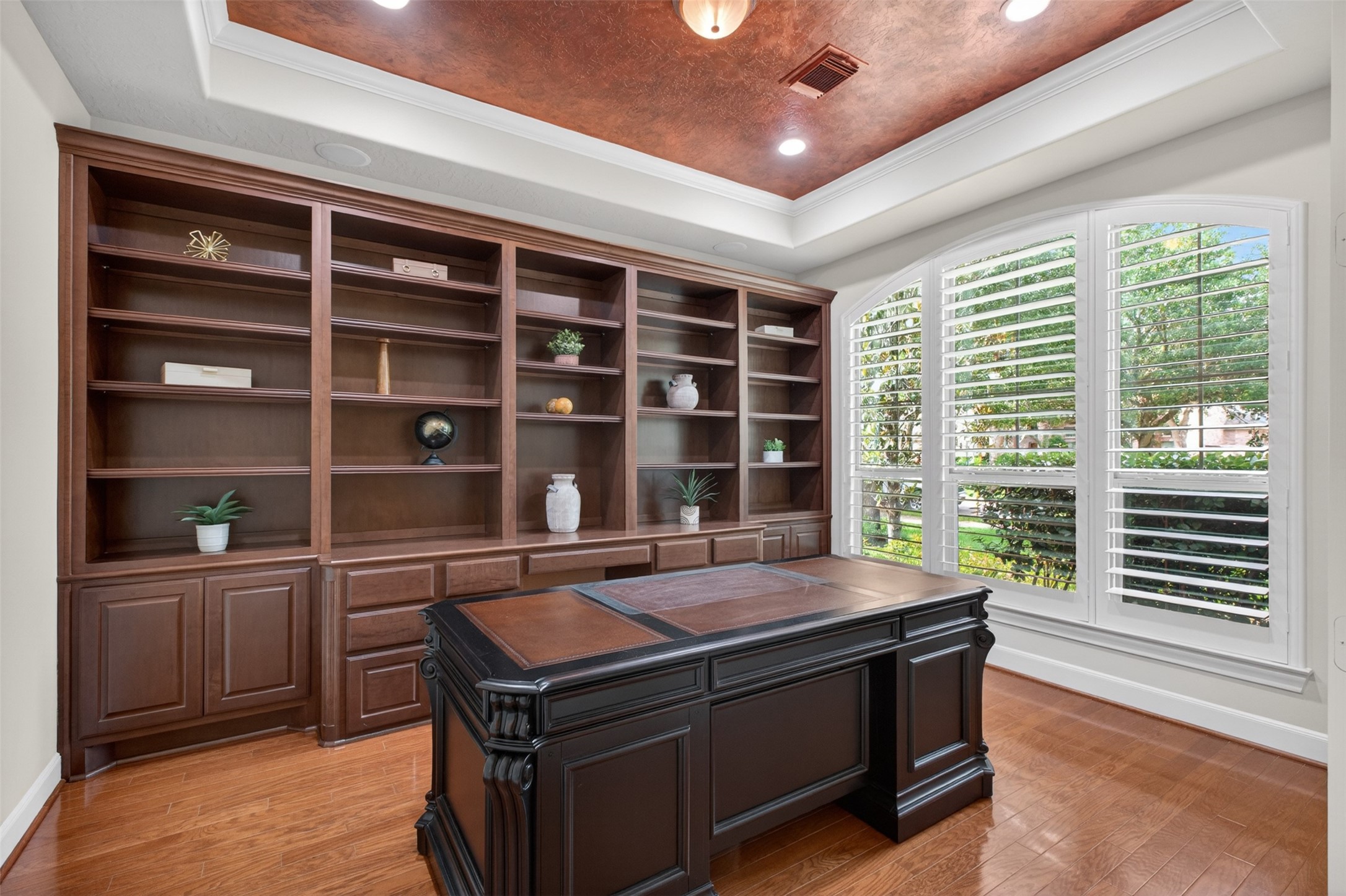 7303 Starry Night Katy, TX 77494 - Photo 5 of 42 Executive office complete with floor to ceiling custom bookcases.