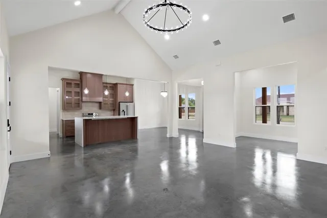 a view of a kitchen and a window