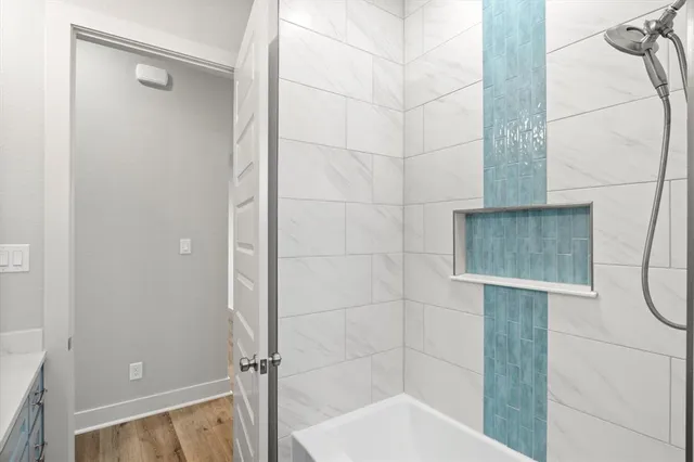 a bathroom with a sink and a shower