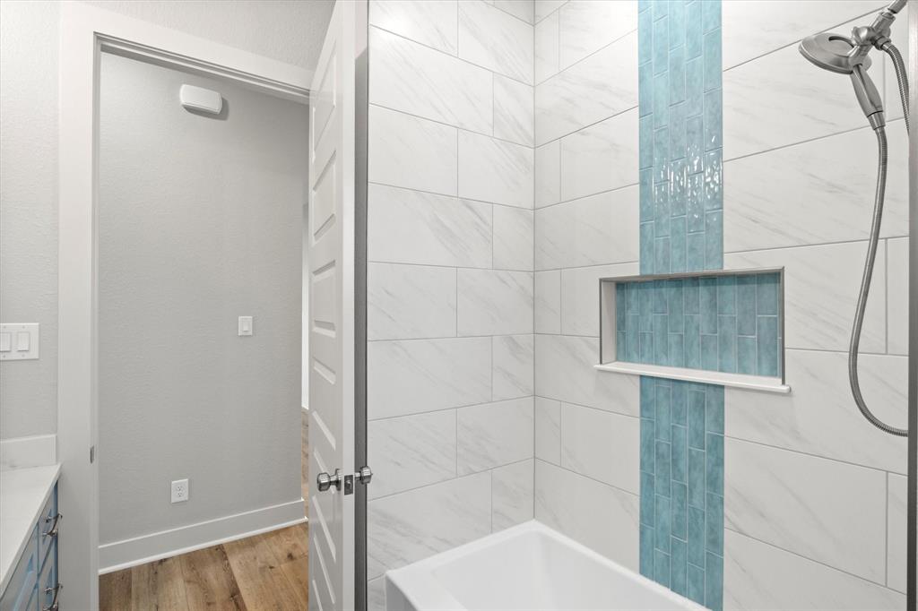 210 Wester Road Ferris, TX 75125 - Photo 19 of 25 a bathroom with a shower