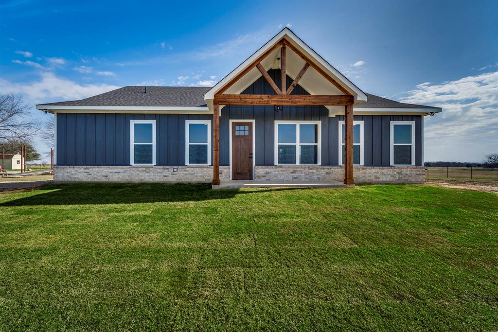210 Wester Road Ferris, TX 75125 - Photo 20 of 25 a front view of a house with a yard