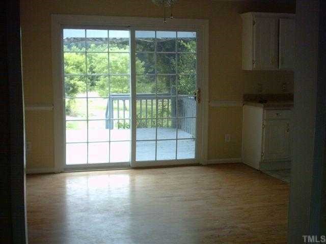 981 Robertson Road Roxboro, NC 27574 - Photo 4 of 7 a view of an empty room with a window