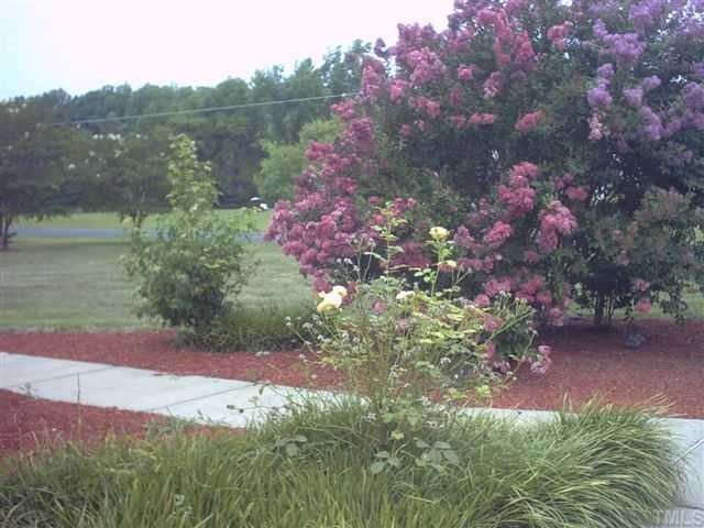981 Robertson Road Roxboro, NC 27574 - Photo 6 of 7 a view of a lake with sitting area