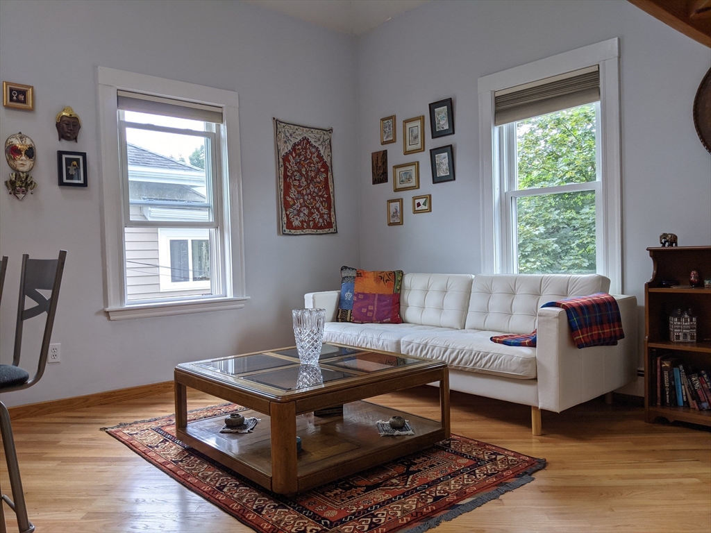 184 White Street, Unit 2 Belmont, MA 02478 - Photo 26 of 29 a living room with furniture and a window