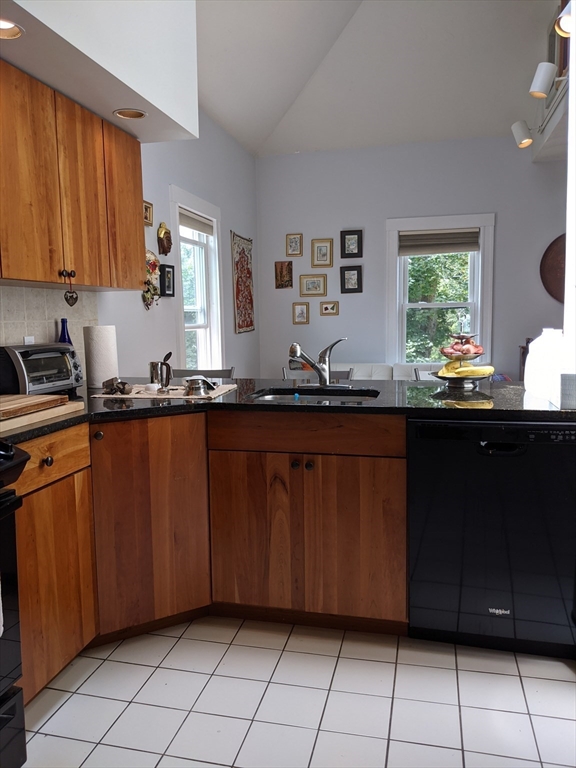 184 White Street, Unit 2 Belmont, MA 02478 - Photo 27 of 29 a kitchen with a sink and cabinets