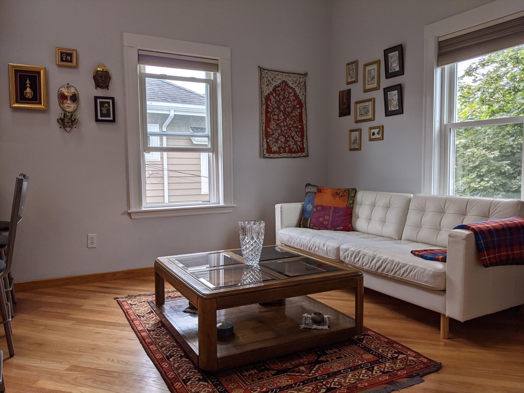 184 White Street, Unit 2 Belmont, MA 02478 - Photo 6 of 29 a living room with furniture and a window