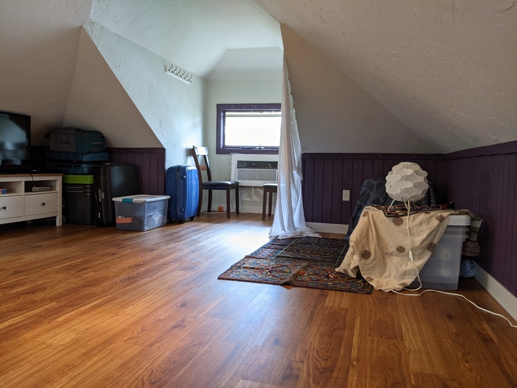 184 White Street, Unit 2 Belmont, MA 02478 - Photo 9 of 29 a living room with furniture and a wooden floor