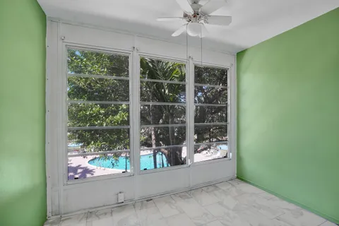 a view of a room with a large window