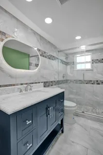 a view of a room with an empty space and a lake view