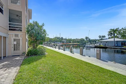 a view of a lake with a building in the background