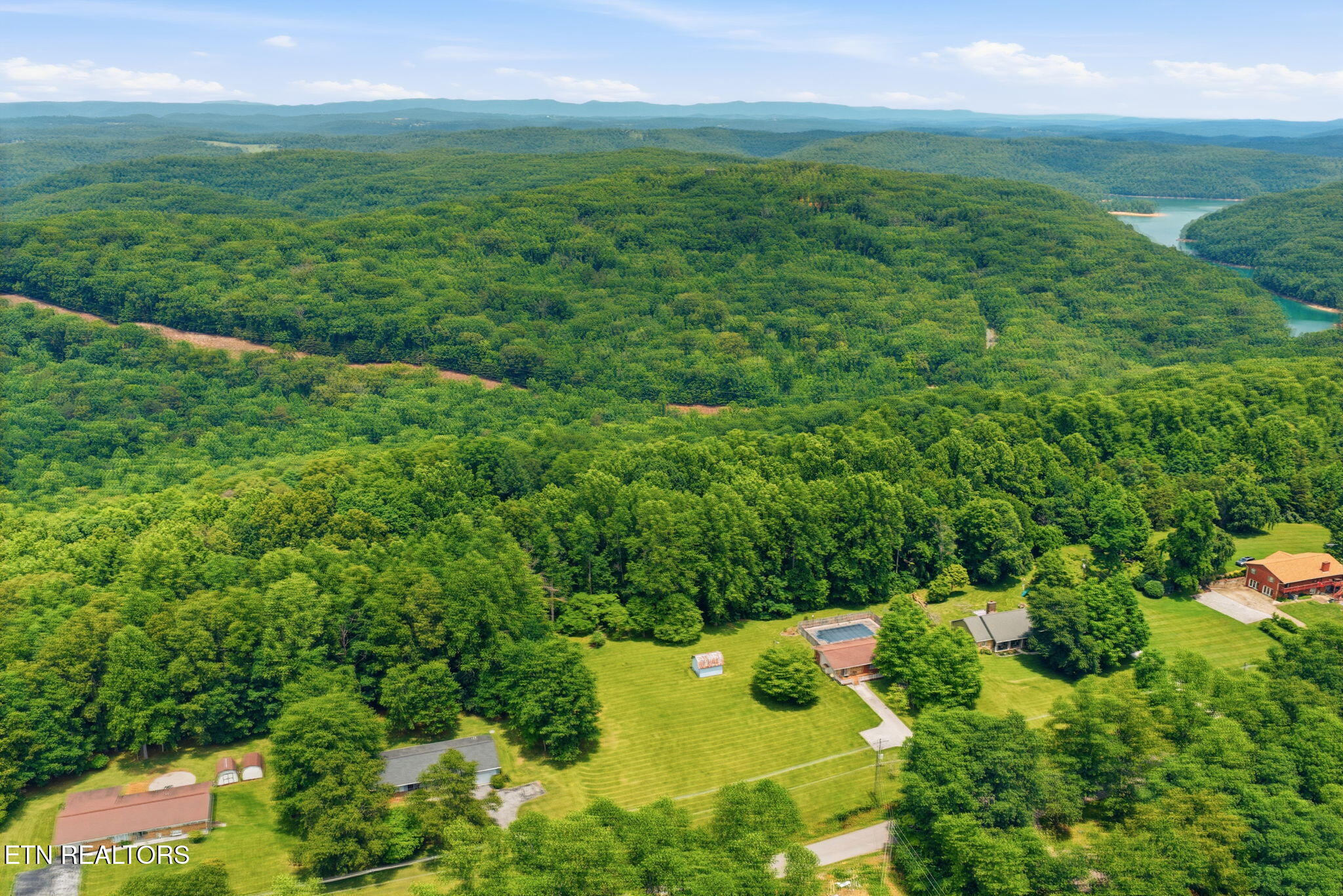 815 Stephens Road Rocky Top, TN 37769 - Photo 4 of 33 53-web-or-mls-DJI_20260529134801_0445_D