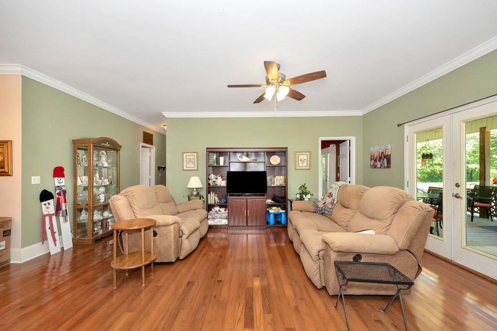 84 Scott Orchard Road Taft, TN 38488 - Photo 7 of 23 a living room with furniture and a flat screen tv