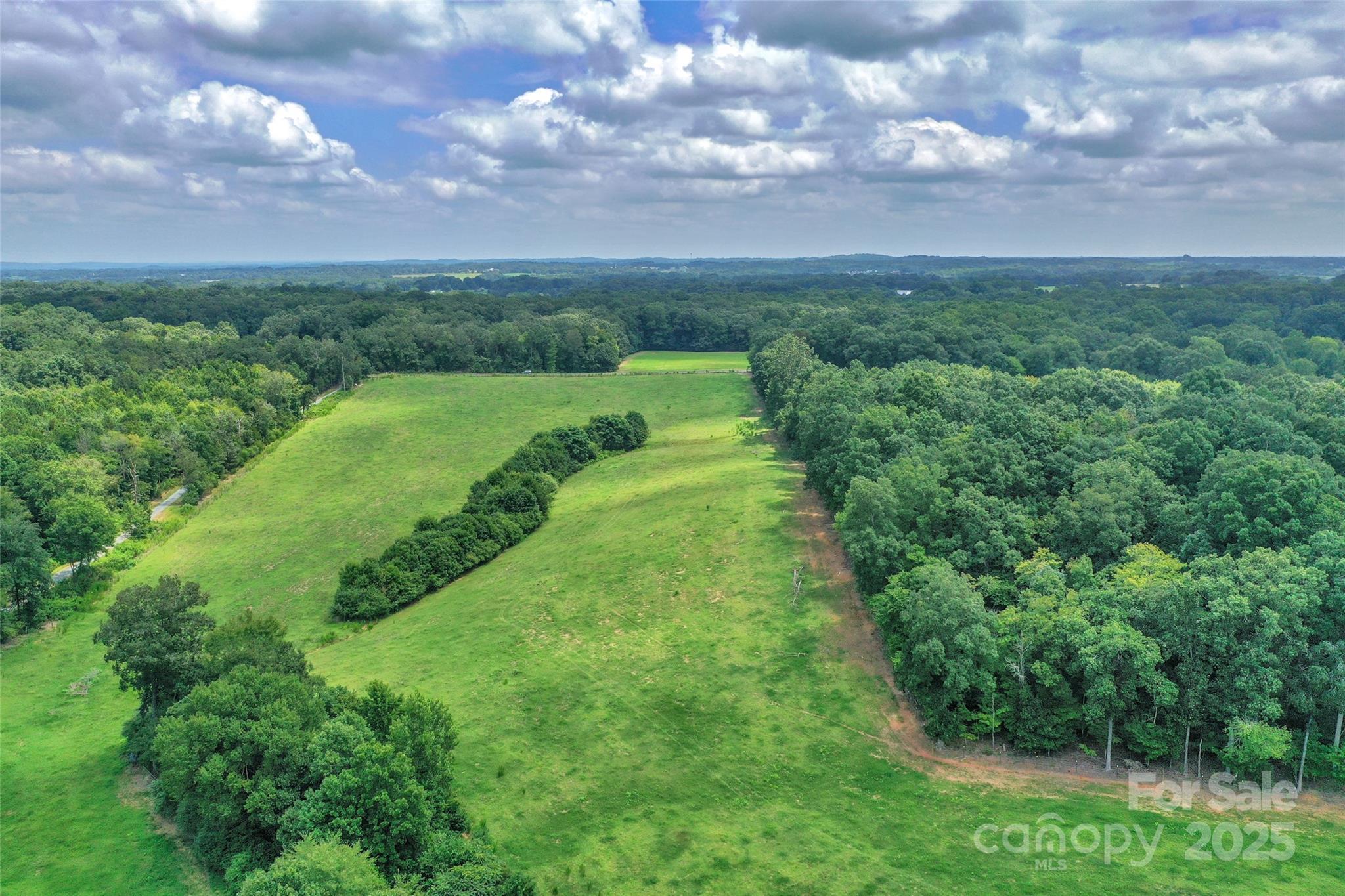 0 Old Goldmine Road, Unit H Marshville, NC 28103 - Photo 30 of 45 a view of a city with lush green forest