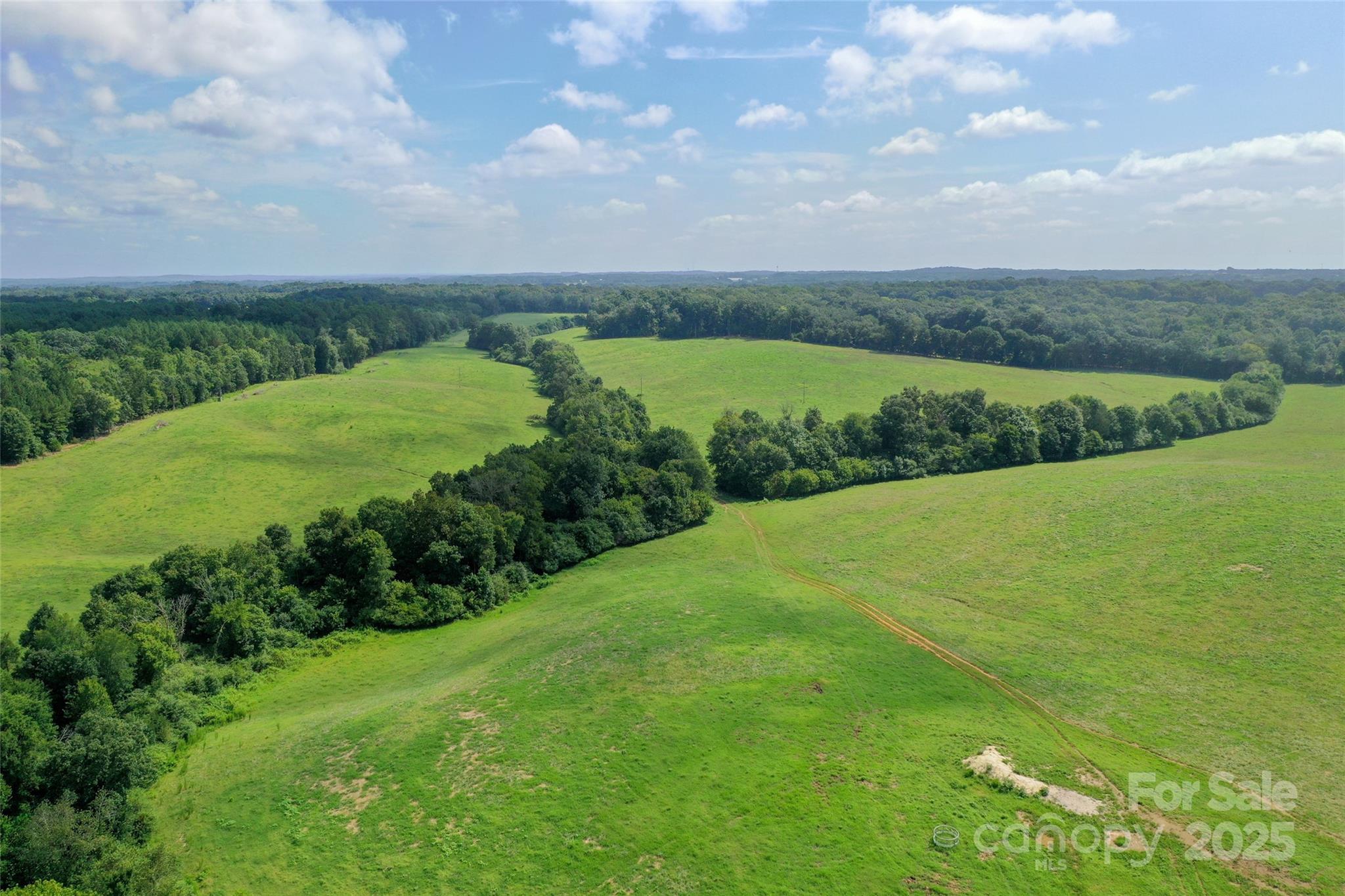 0 Old Goldmine Road, Unit H Marshville, NC 28103 - Photo 4 of 45 a view of a lake with a yard