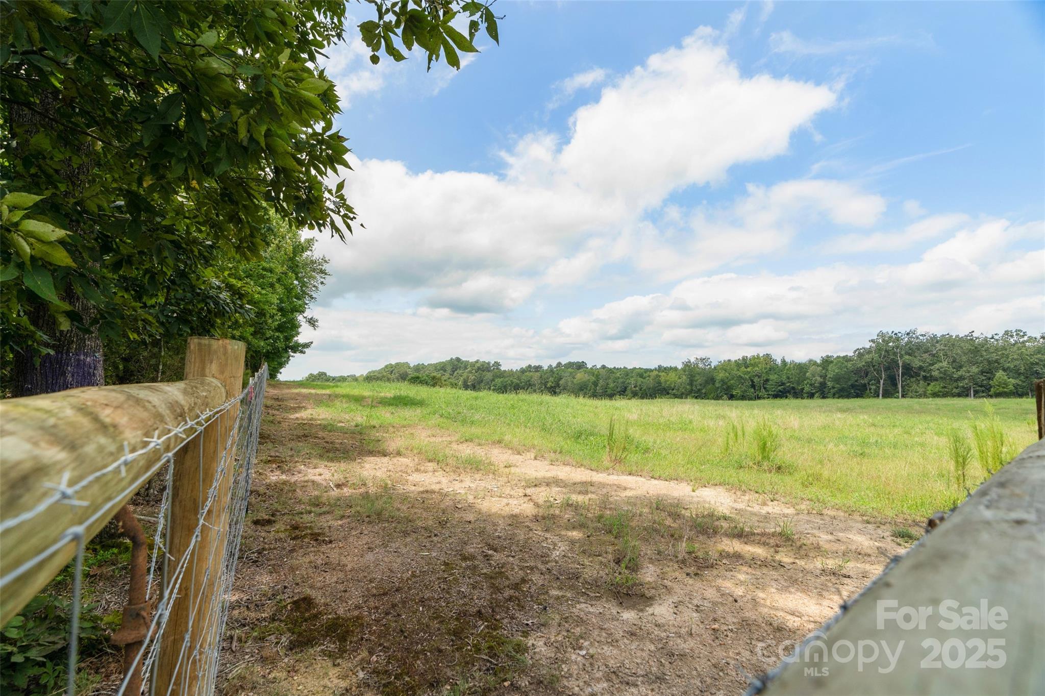 0 Old Goldmine Road, Unit H Marshville, NC 28103 - Photo 41 of 45 a view of a lake with houses in the back